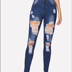 Skinny jeans w/ rips, just how the pictures shows.